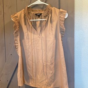 Express sleeveless blouse. New